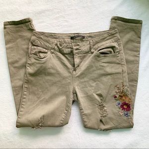 Green embroidered jeans